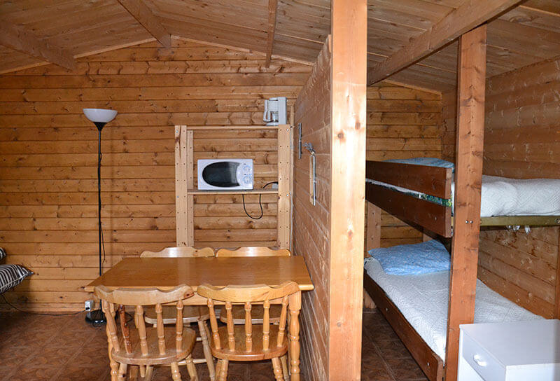 Séjour et chambre avec lits superposés Chalet Tilleul